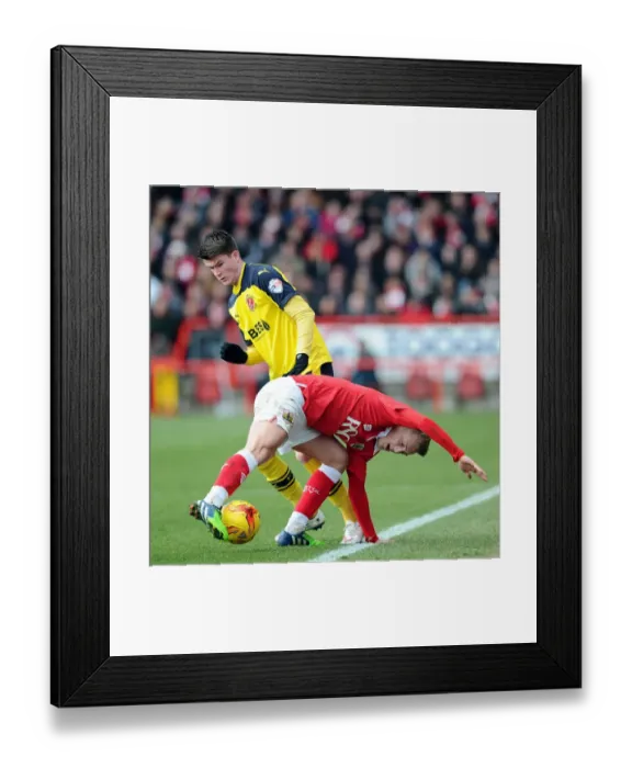 Framed Print : Bristol City vs Fleetwood Town: George Saville vs Gareth Evans Battle for Ball in Sky Bet League One Clash Framed Print : Bristol City vs Fleetwood Town: George Saville vs Gareth Evans Battle for Ball in Sky Bet League One Clash