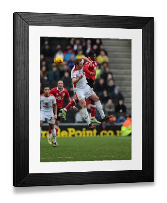 Framed Print : Battling Rivals: Mark Little vs. Dean Lewington - A Football Showdown