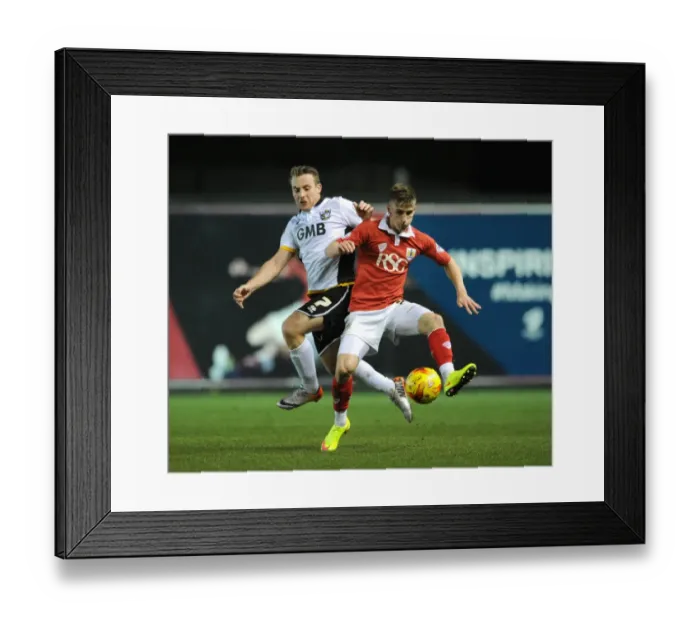 Framed Print : Intense Rivalry: Bryan vs Birchall Battle for the Ball in Bristol City vs Port Vale Framed Print : Intense Rivalry: Bryan vs Birchall Battle for the Ball in Bristol City vs Port Vale