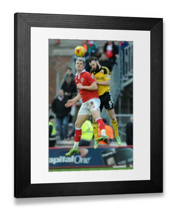 Framed Print : Intense Aerial Clash: Matt Smith vs John Brayford in Bristol City vs Sheffield United Framed Print : Intense Aerial Clash: Matt Smith vs John Brayford in Bristol City vs Sheffield United