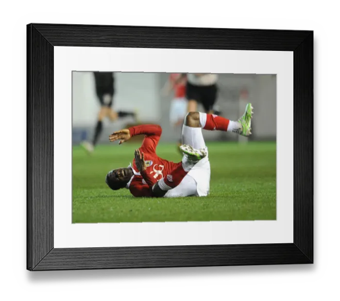 Framed Print : Bristol City's Kieran Agard Suffers Injury in Action Against Peterborough United Framed Print : Bristol City's Kieran Agard Suffers Injury in Action Against Peterborough United