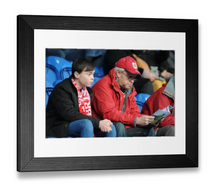 Framed Print : Bristol City's Unwavering Support: Sky Bet League One Battle at Colchester United (February 2015) Framed Print : Bristol City's Unwavering Support: Sky Bet League One Battle at Colchester United (February 2015)