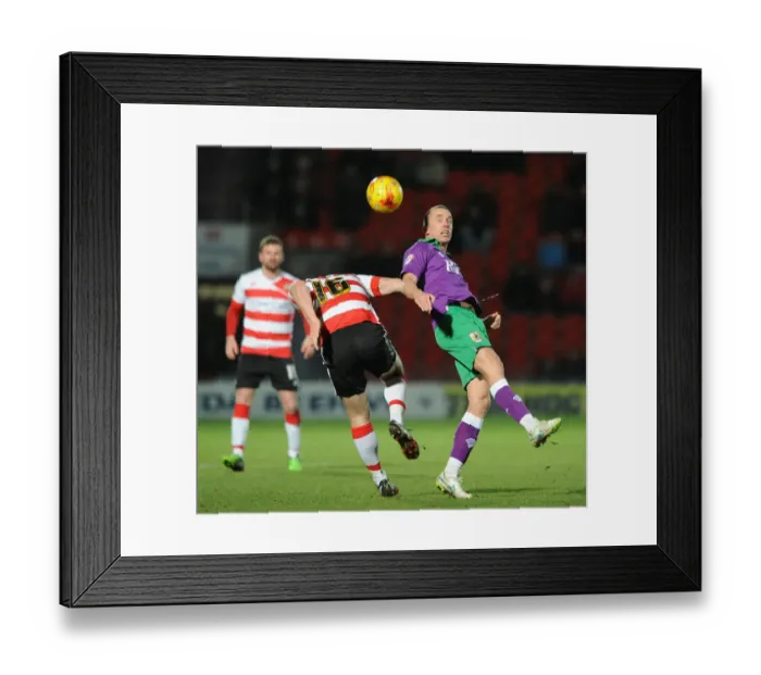 Framed Print : Bristol City's Wilbraham vs. Butler: Heading Battle at Doncaster's Keepmoat Stadium, 2015 Framed Print : Bristol City's Wilbraham vs. Butler: Heading Battle at Doncaster's Keepmoat Stadium, 2015