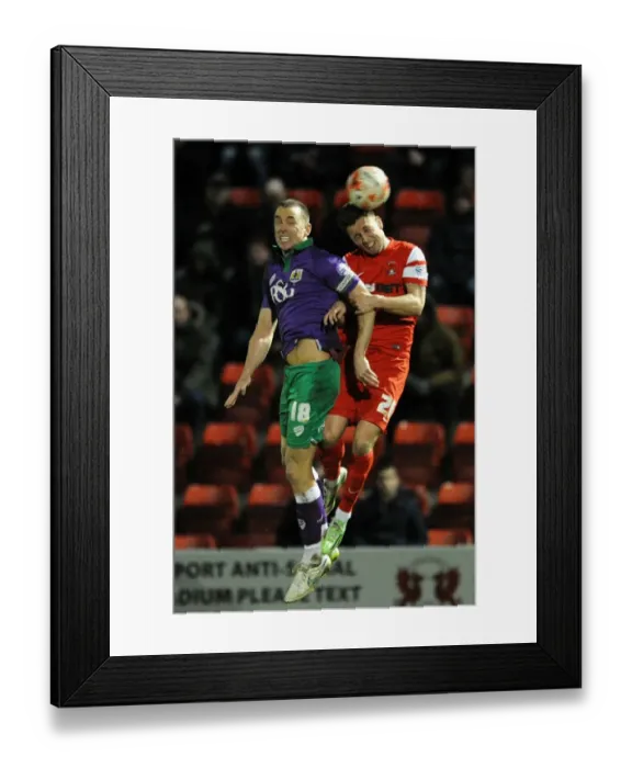 Framed Print : Aaron Wilbraham vs Luke O'Neil: Heading Battle at Brisbane Road, Leyton Orient vs Bristol City, Sky Bet League One