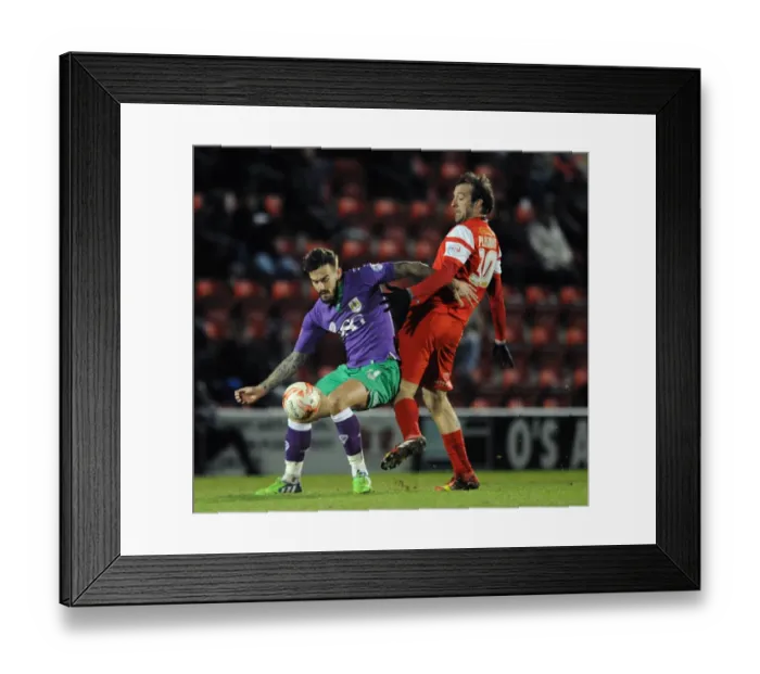 Framed Print : Maron Pack vs. Gianvito Plasmati: Intense Battle for the Ball in Leyton Orient vs. Bristol City Football Match, Sky Bet League One (03.03.2015) Framed Print : Maron Pack vs. Gianvito Plasmati: Intense Battle for the Ball in Leyton Orient vs. Bristol City Football Match, Sky Bet League One (03.03.2015)