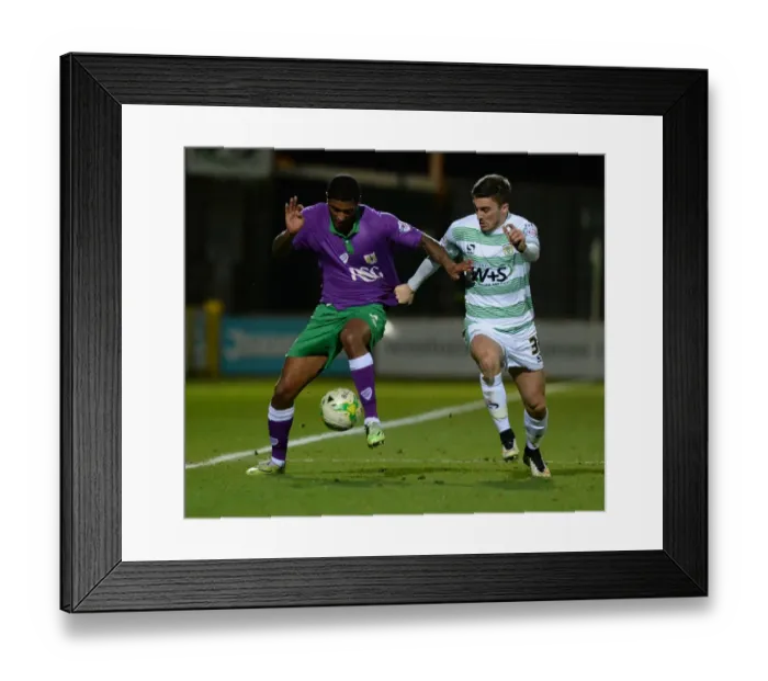 Framed Print : Battling for Supremacy: Derrick Williams vs. Adam Morgan in Yeovil Town vs. Bristol City Football Match, 2015