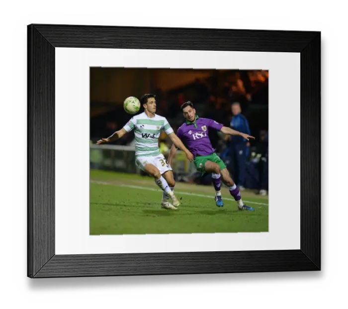 Framed Print : Bristol City's Greg Cunningham Scores Past Liam Shepard in Yeovil Town Showdown Framed Print : Bristol City's Greg Cunningham Scores Past Liam Shepard in Yeovil Town Showdown