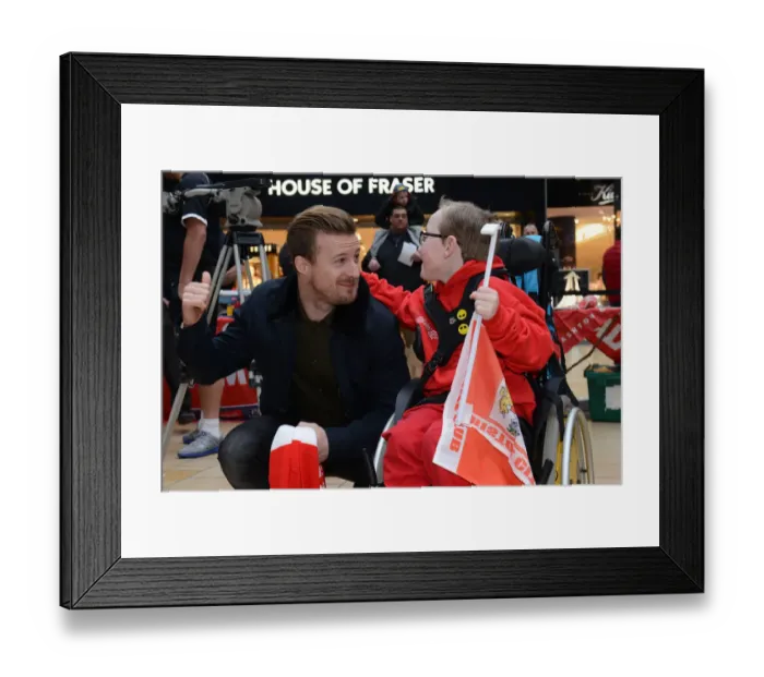 Framed Print : Bristol City's Wade Elliott Engages with Oskar at Cabot Circus during Johnstones Paint Trophy Match Framed Print : Bristol City's Wade Elliott Engages with Oskar at Cabot Circus during Johnstones Paint Trophy Match