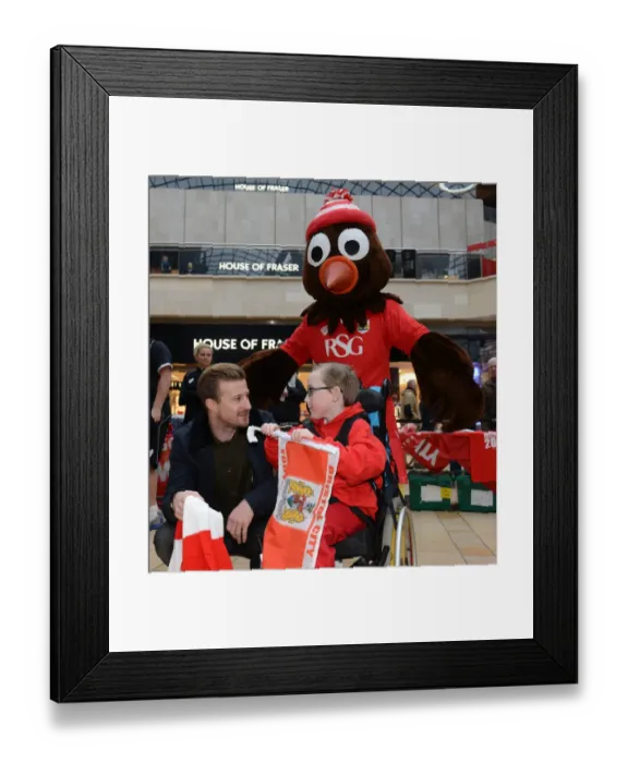 Framed Print : Wade Elliott of Bristol City Engages with Oskar at Cabot Circus during Johnstones Paint Trophy Match, 2015 Framed Print : Wade Elliott of Bristol City Engages with Oskar at Cabot Circus during Johnstones Paint Trophy Match, 2015