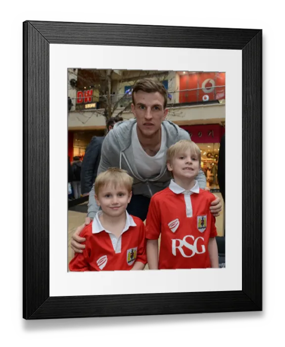 Framed Print : Bristol City's Aden Flint Celebrates with Fans at Cabot Circus after JPT Victory