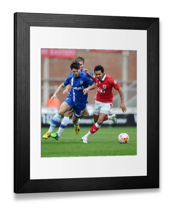 Framed Print : Bristol City vs Gillingham: Intense Battle for the Ball between Korey Smith and Aaron Morris Framed Print : Bristol City vs Gillingham: Intense Battle for the Ball between Korey Smith and Aaron Morris