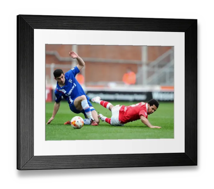 Framed Print : Battling for Supremacy: Korey Smith vs John Egan in Intense Bristol City vs Gillingham Clash