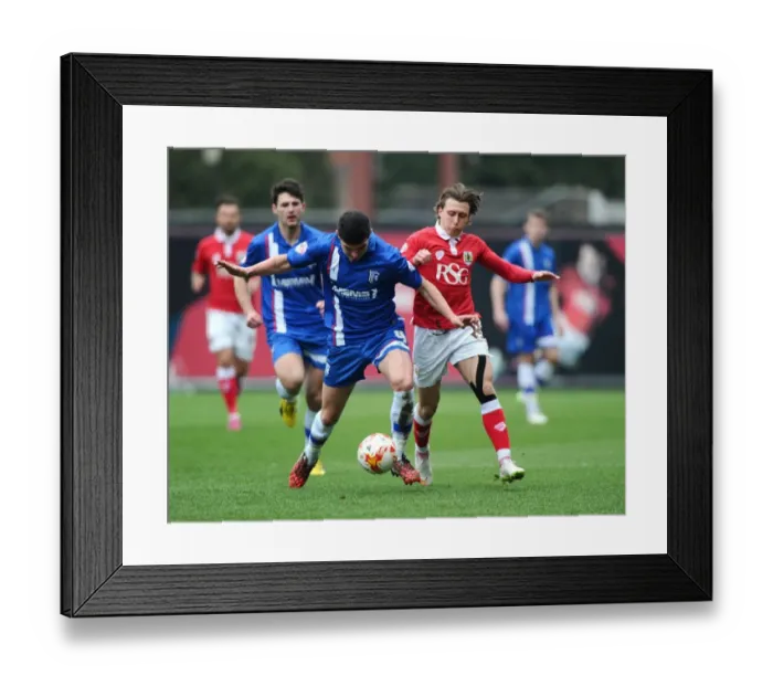 Framed Print : Battling for Supremacy: Luke Freeman vs John Egan in Bristol City vs Gillingham Clash Framed Print : Battling for Supremacy: Luke Freeman vs John Egan in Bristol City vs Gillingham Clash