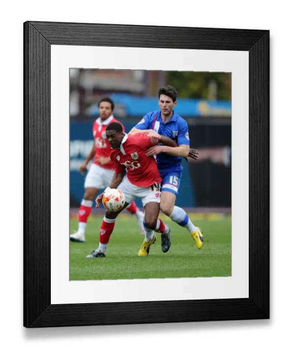 Framed Print : Bristol City vs Gillingham: Intense Battle Between Kieran Agard and Aaron Morris Framed Print : Bristol City vs Gillingham: Intense Battle Between Kieran Agard and Aaron Morris