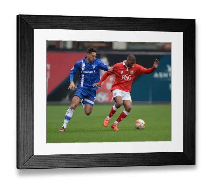 Framed Print : Battling for Supremacy: Mark Little vs Joe Martin in Bristol City vs Gillingham Clash Framed Print : Battling for Supremacy: Mark Little vs Joe Martin in Bristol City vs Gillingham Clash