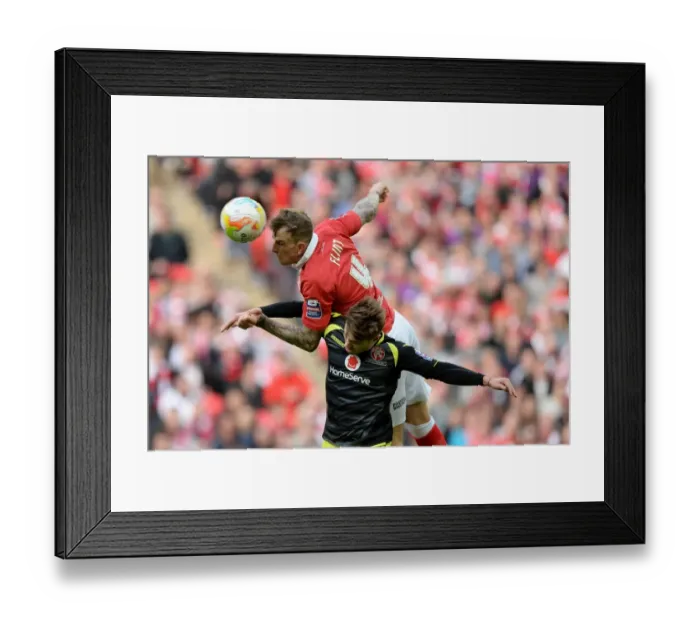 Framed Print : Aden Flint Claims High Ball Victory for Bristol City in Johnstone's Paint Trophy Final vs Walsall
