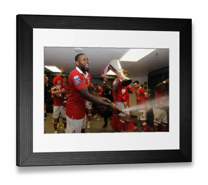 Framed Print : Bristol City FC: Johnstone's Paint Trophy Victory - Jay Emmanuel-Thomas Celebrates with Champagne