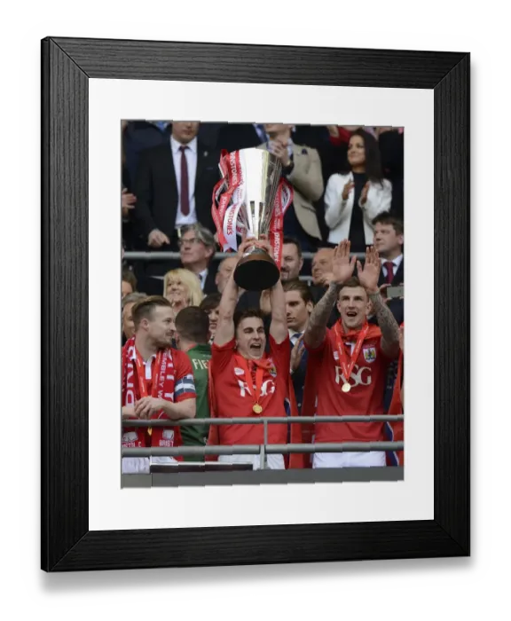 Framed Print : Bristol City Lifts Johnstone's Paint Trophy: Joe Bryan Celebrates Victory Against Walsall at Wembley Stadium Framed Print : Bristol City Lifts Johnstone's Paint Trophy: Joe Bryan Celebrates Victory Against Walsall at Wembley Stadium