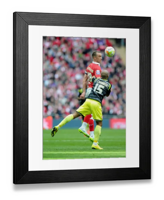 Framed Print : Battling for Glory: Wilbraham vs Chambers in the Johnstone's Paint Trophy Final