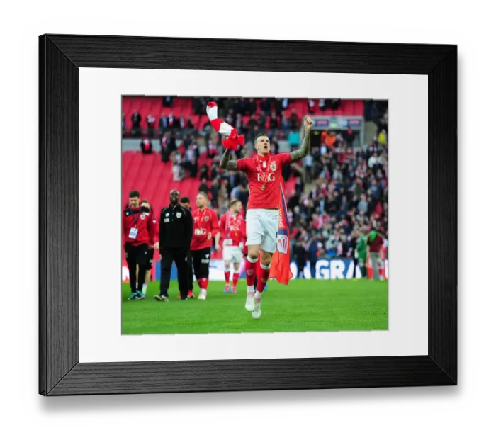 Framed Print : Aden Flint's Triumphant Moment: Bristol City's Johnstone's Paint Trophy Victory at Wembley