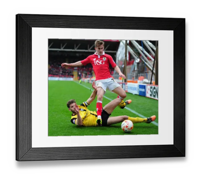 Framed Print : Bristol City vs Barnsley: Martin Cranie Fouls Joe Bryan