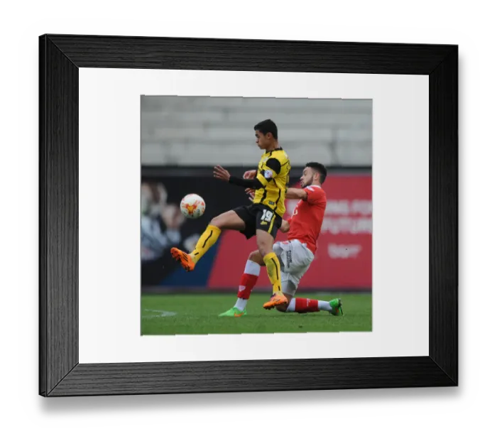 Framed Print : Intense Moment: Derrick Williams vs. Cameron Stewart in Bristol City vs. Barnsley Football Match, March 2015 Framed Print : Intense Moment: Derrick Williams vs. Cameron Stewart in Bristol City vs. Barnsley Football Match, March 2015