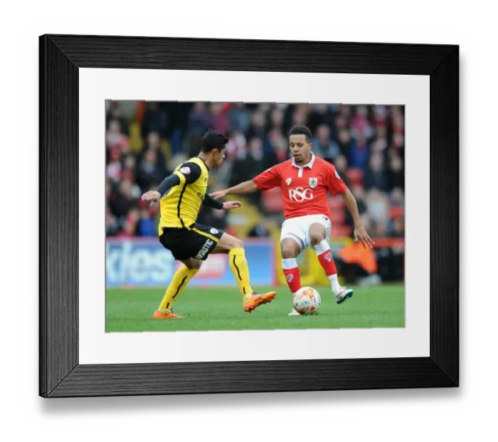 Framed Print : Bristol City vs Barnsley: Intense Moment as Cameron Stewart Closes In on Korey Smith Framed Print : Bristol City vs Barnsley: Intense Moment as Cameron Stewart Closes In on Korey Smith