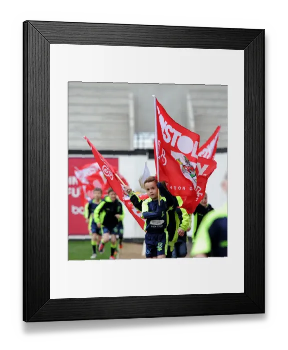 Framed Print : Mascots from Hutton JFC Parade at Half-Time during Bristol City vs Barnsley Football Match, Ashton Gate Stadium (Sky Bet League One)