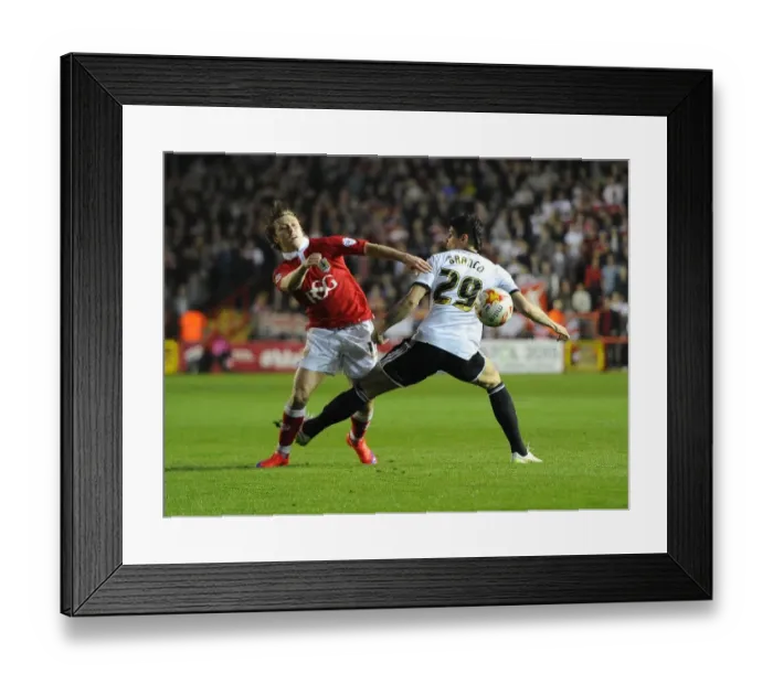 Framed Print : Battling for Supremacy: Luke Freeman vs. Raphael Rossi Branco in the Intense Clash between Bristol City and Swindon Town