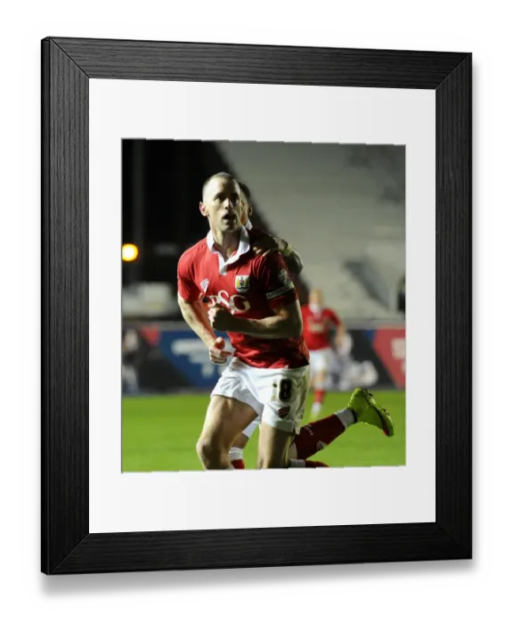 Framed Print : Bristol City's Aaron Wilbraham and James Tavernier Celebrate Goal Against Swindon Town, Sky Bet League One, April 2015 Framed Print : Bristol City's Aaron Wilbraham and James Tavernier Celebrate Goal Against Swindon Town, Sky Bet League One, April 2015