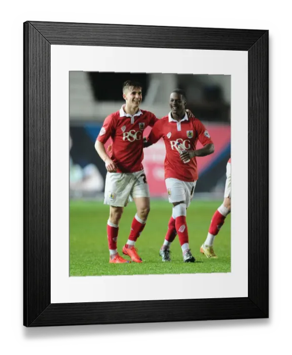 Framed Print : Bristol City Celebrates Promotion: Bryan and Agard Rejoice on Final Whistle vs. Swindon Town (07-04-2015)