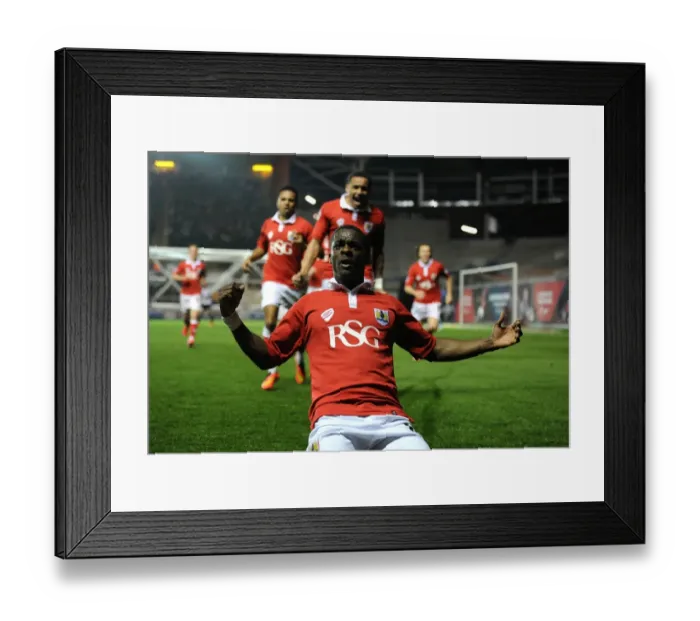 Framed Print : Euphoric Moment: Kieran Agard's Thrilling Goal Celebration vs. Swindon Town (2015) Framed Print : Euphoric Moment: Kieran Agard's Thrilling Goal Celebration vs. Swindon Town (2015)