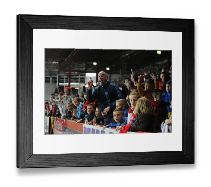 Framed Print : Exultant Fan Scores in Thrilling Bristol City Victory over Swindon Town Framed Print : Exultant Fan Scores in Thrilling Bristol City Victory over Swindon Town