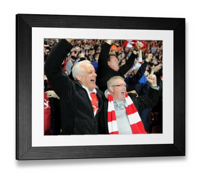 Framed Print : Bristol City's Joe Bryan Scores Dramatic Winning Goal vs. Swindon Town: Fans Euphoric Reaction Framed Print : Bristol City's Joe Bryan Scores Dramatic Winning Goal vs. Swindon Town: Fans Euphoric Reaction