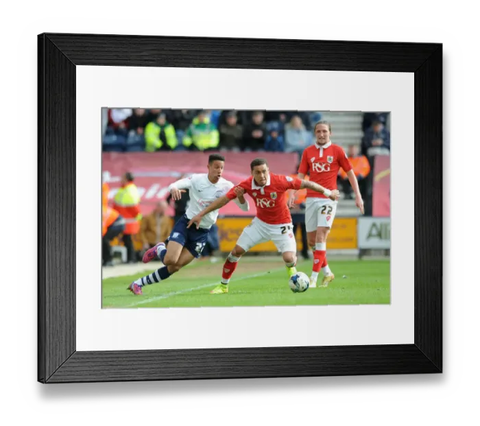 Framed Print : Clash at Deepdale: Preston's Robinson Stops Tavernier's Advance - Football, Preston North End v Bristol City (11 / 04 / 2015) Framed Print : Clash at Deepdale: Preston's Robinson Stops Tavernier's Advance - Football, Preston North End v Bristol City (11 / 04 / 2015)