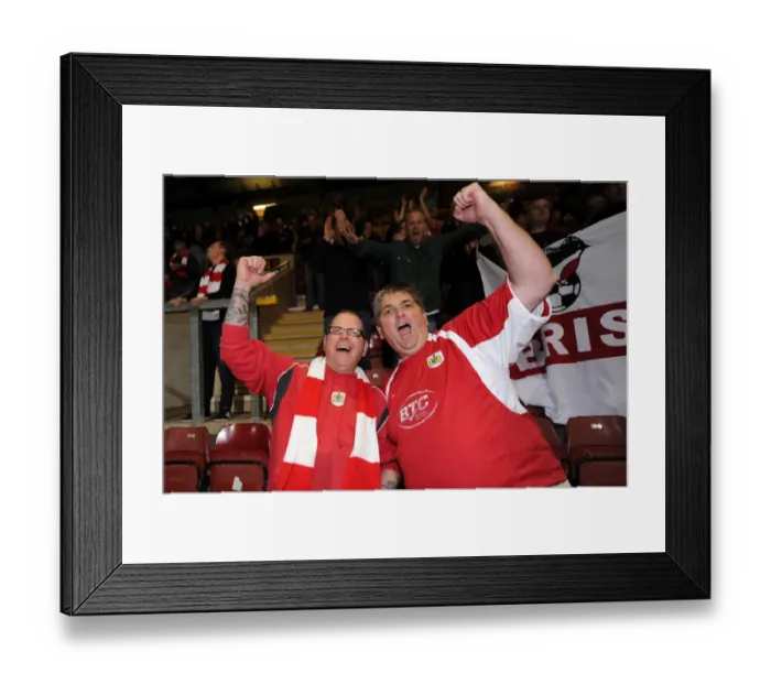 Framed Print : Bristol City Fans Celebrate Promotion-Winning Moment at Bradford City (140415) Framed Print : Bristol City Fans Celebrate Promotion-Winning Moment at Bradford City (140415)