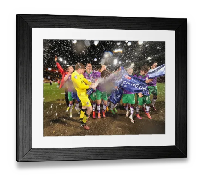 Framed Print : Bristol City Clinches Promotion to Championship with 0-6 Win over Bradford: Frank Fielding Celebrates with Champagne