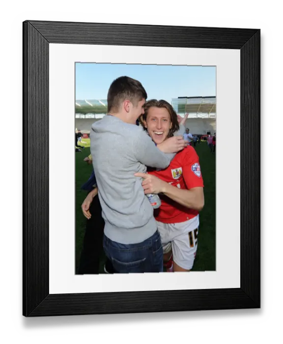 Framed Print : Bristol City's Luke Freeman Celebrates Promotion: Thrilling Moment as City Clinch League One Title Framed Print : Bristol City's Luke Freeman Celebrates Promotion: Thrilling Moment as City Clinch League One Title