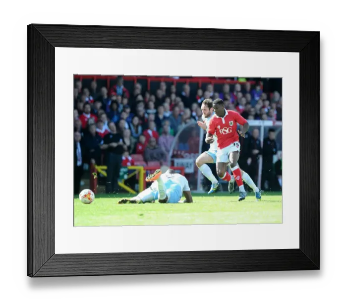 Framed Print : Bristol City's Kieran Agard Scores Past Coventry City's Reda Johnson - Sky Bet League One Thriller at Ashton Gate Framed Print : Bristol City's Kieran Agard Scores Past Coventry City's Reda Johnson - Sky Bet League One Thriller at Ashton Gate