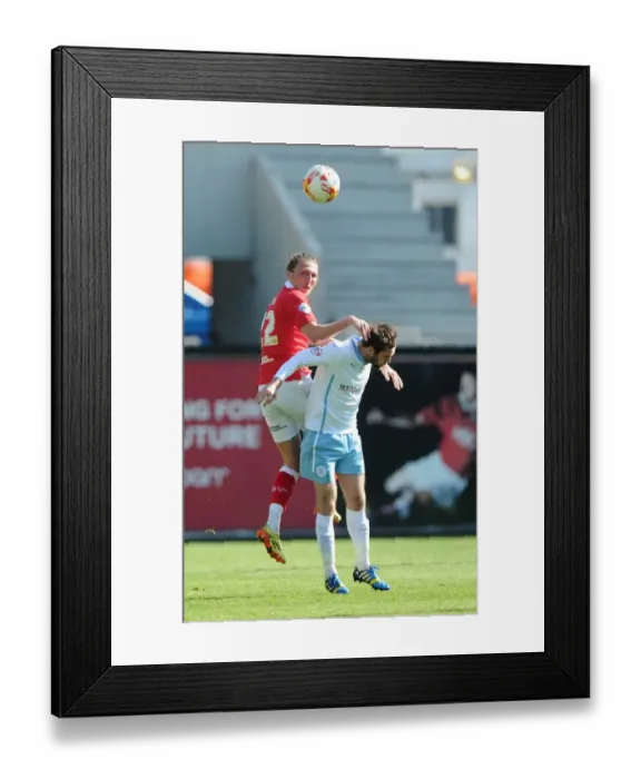 Framed Print : Battling for Supremacy: Ayling vs. Proschwitz in the Sky Bet League One Clash at Ashton Gate