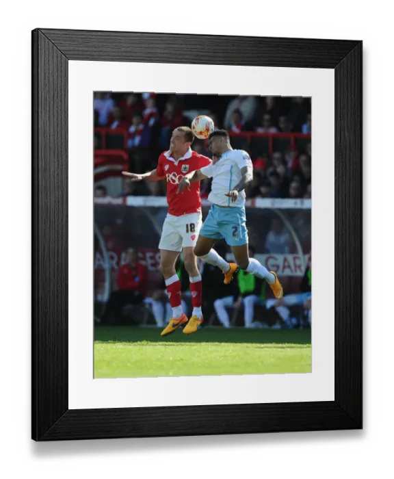 Framed Print : Battling for Supremacy: Wilbraham vs. Willis in the Sky Bet League One Clash at Ashton Gate