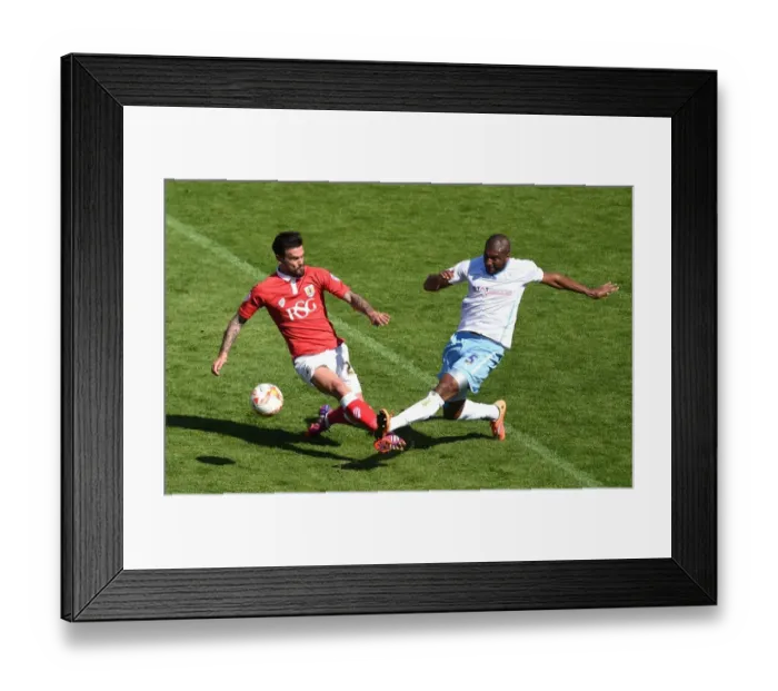 Framed Print : Maron Pack vs. Reda Johnson: Intense Moment from Bristol City's Victory over Coventry City, April 18, 2015