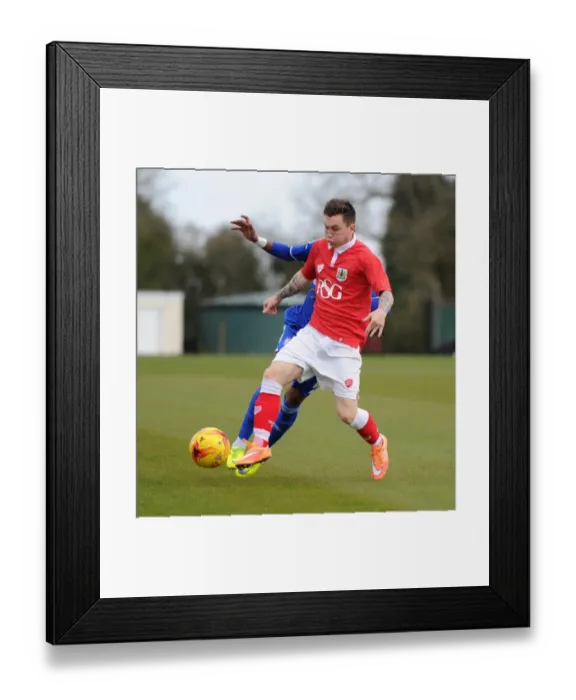 Framed Print : Bristol City's Jamie Horgan Takes the Ball from Ipswich Town's Kundai Benyu during U21 PDL2 Match