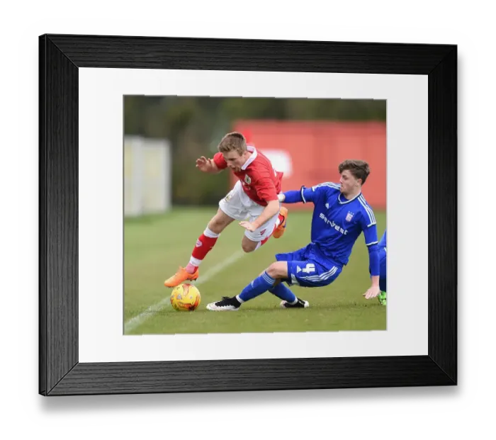 Framed Print : Bristol City vs Ipswich Town: Joe Morrell vs James Blanchfield - Intense Battle on the Field