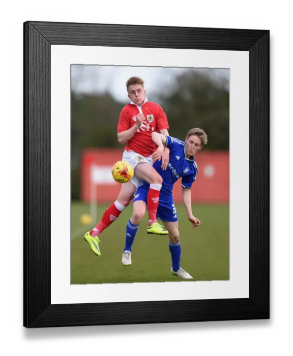 Framed Print : Intense Rivalry: Lemonheigh-Evans vs Wyatt Battle on the Football Field - Bristol City vs Ipswich Town