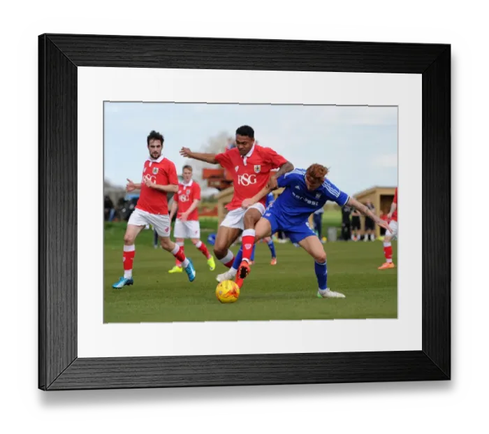 Framed Print : Intense Rivalry: Marley Bishop vs. Josh Yowery - A Football Showdown at Failand Training Ground