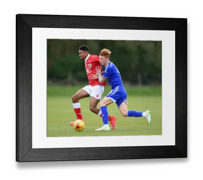 Framed Print : Intense Rivalry: Marley Bishop vs Josh Yowery - A Football Showdown at Failand Training Ground