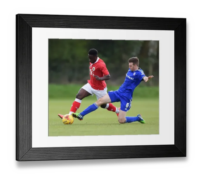 Framed Print : Bristol City vs Ipswich Town: Matt Mattis vs Joe Robinson Clash in U21 PDL2 Match