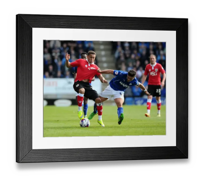 Framed Print : Battling for Supremacy: Tavernier vs. Morsy in Chesterfield vs. Bristol City Clash Framed Print : Battling for Supremacy: Tavernier vs. Morsy in Chesterfield vs. Bristol City Clash