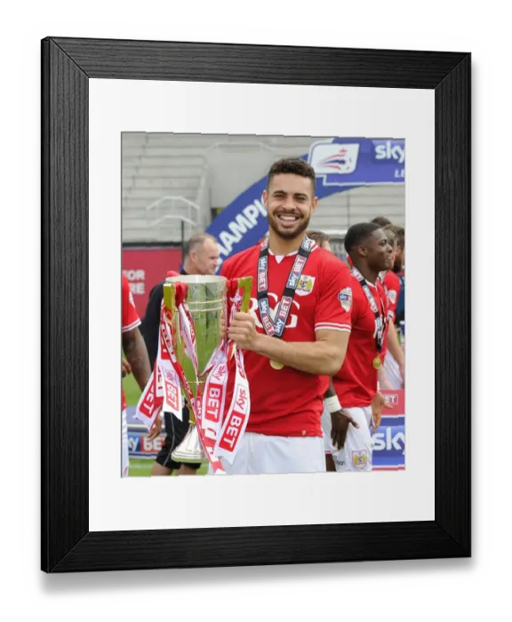 Framed Print : Bristol City Crowned Champions: Derrick Williams Lifts the Sky Bet League One Trophy